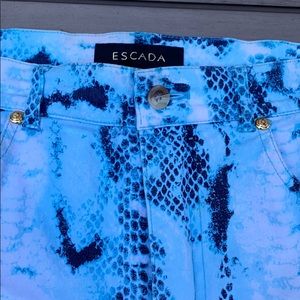 Escada vintage woman’s snake skin pattern.
